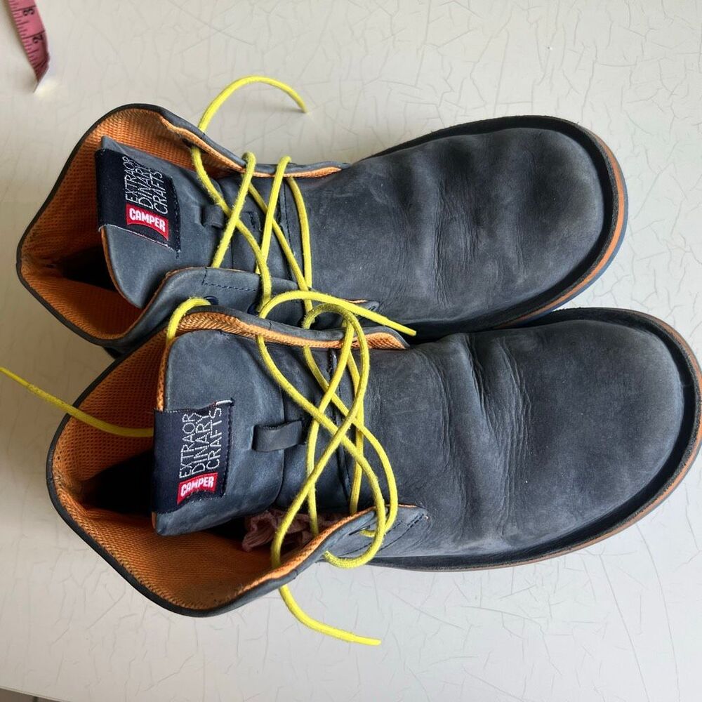 Camper Extraordinary Crafts chukka boots feature dark gray suede uppers and vibr